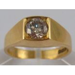 An 18 carat gold diamond solitaire ring,