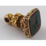 A fine antique gold and bloodstone seal with engraved crest, approx 3.5cm, 19.8 gms.