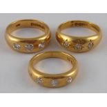 A mixed lot comprising three yellow metal (tests 18 carat gold) three stone diamond rings of good