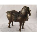 A Chinese bronze horse in the archaic manner. ht.29cm.