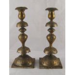 Judaica. A pair of Polish brass Shabat candlesticks . ht.31cm.