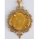 A loose mounted gold sovereign pendant on a 9 carat gold chain, gross weight approx 17.2 gms.