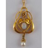 A yellow metal (tests 18 carat gold) opal and cultured pearl Art Nouveau style pendant,
