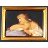 An oil on panel portrait of a young girl resting against a cushion. 13.5x9cm., frame 20x16cm.
