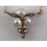 An Edwardian old cut diamond and untested pearl pendant, approx 2cm, weight 3 gms.