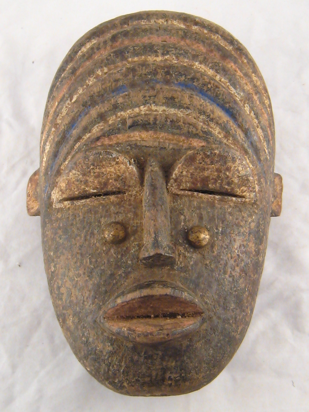 A Bete tribal mask , Ivory Coast. 20x30cm.