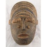 A Bete tribal mask , Ivory Coast. 20x30cm.