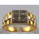 A yellow metal (tests 18 carat gold) diamond ring, size Q ½, 6.2 gms.