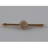 A Swiss hallmarked 18 carat gold old brilliant cut diamond and seed pearl bar brooch,