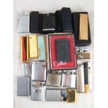 A mixed lot of twenty Ronson, Colibri and other cigarette lighters.