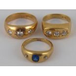 A mixed lot comprising a yellow metal (tests 18 carat gold) three stone diamond ring (8.