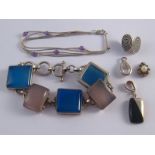 A mixed lot of white metal (tests silver) jewellery.