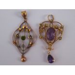 A mixed lot comprising two yellow metal (tests 9 carat gold) Art Nouveau style pendants,