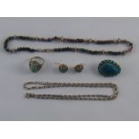 A mixed lot of white and gilt metal (tests silver) jewellery comprising a pair of antique turquoise