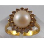 A yellow metal (tests 18 carat gold) cultured pearl ring, pearl approx 7.