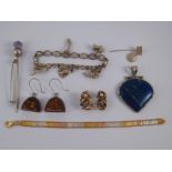 A mixed lot of white metal (tests silver) jewellery comprising a lapis lazuli pendant,