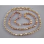 Two freshwater cultured pearl necklaces, lacking clasps, longest approx 49cm long.