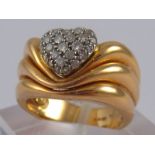 An 18 carat gold diamond heart ring, size M ½, 10.4 gms.