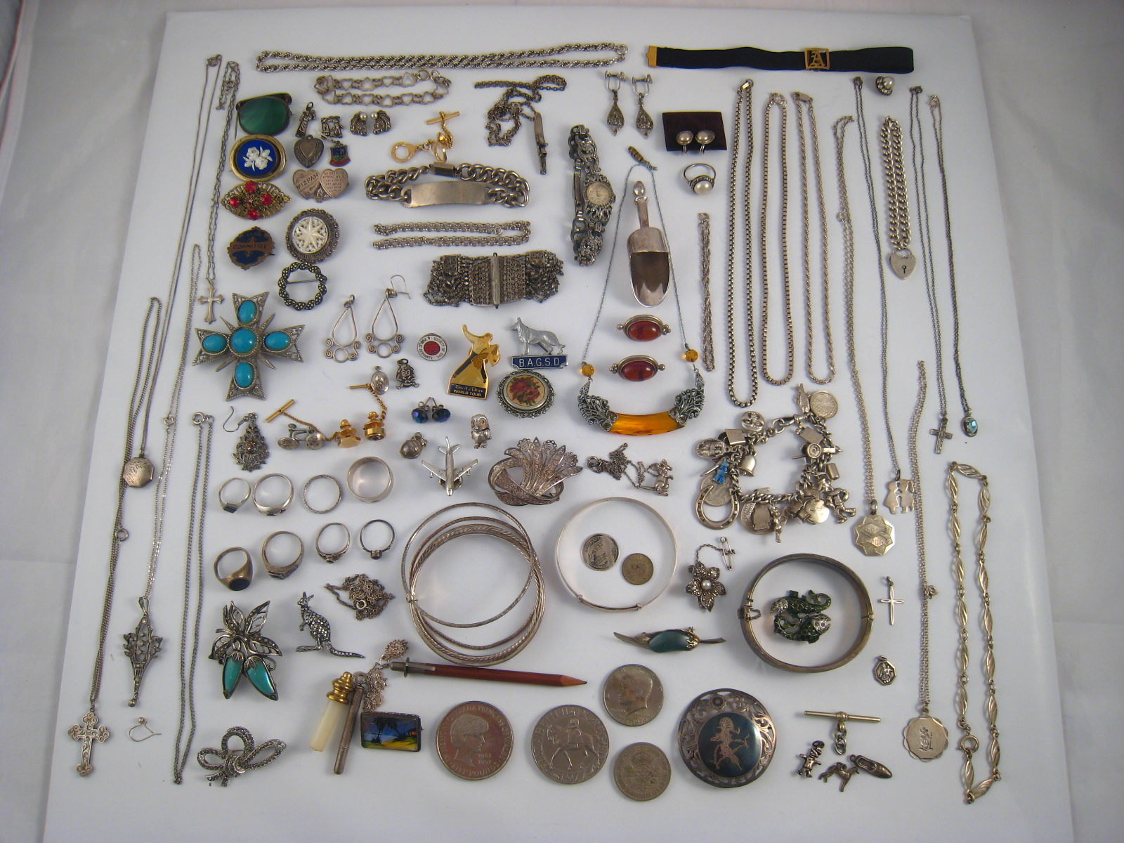 A mixed lot comprising a quantity of white metal (tests silver) and costume jewellery.