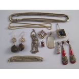 A mixed lot of white metal (tests silver) jewellery comprising earrings, pendants, chains etc.