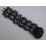 A 19th century Berlin Iron bracelet, (clasp A/F), approx 16cm long.