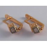 A pair of Soviet Russian hallmarked 583 standard (approx 14 carat) gold diamond earrings,