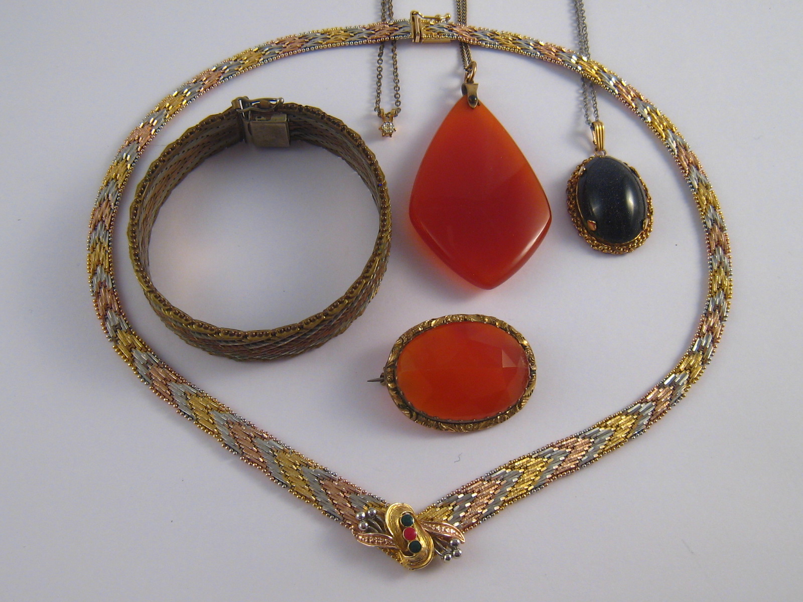 A mixed lot comprising a three colour bracelet and a similar necklace, necklace marked 925 Italy,