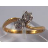 A 9 carat gold two stone diamond ring, estimated total diamond content approx 0.