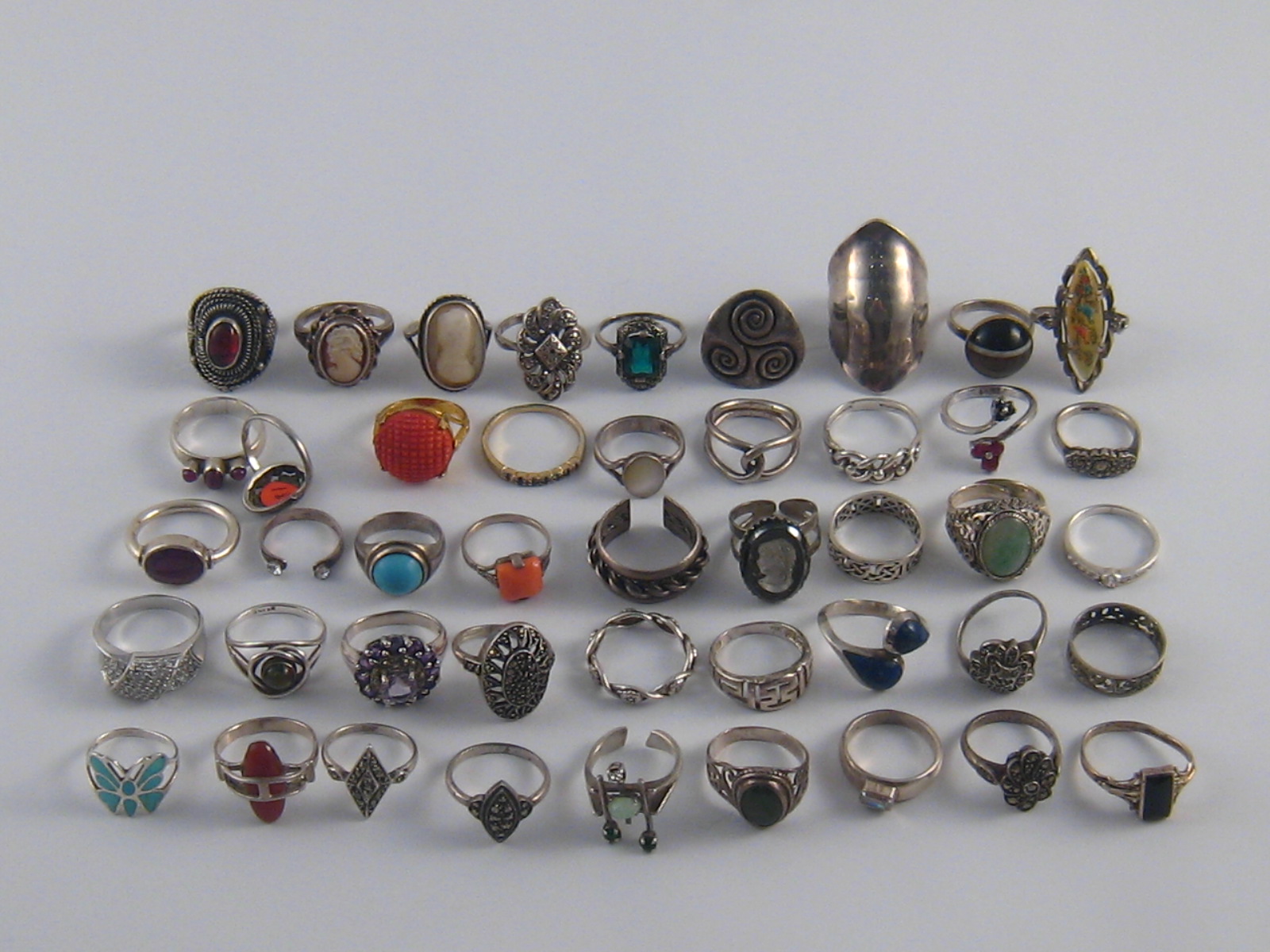 A mixed lot comprising approx 45 white metal and white metal (tests silver) rings,