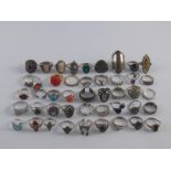 A mixed lot comprising approx 45 white metal and white metal (tests silver) rings,