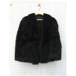A mink fur jacket, size S.