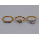 A mixed lot comprising three diamond rings, all marked 18ct plat, ring sizes J-L, gross weight 6.