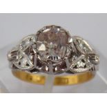 A yellow and white metal diamond ring, marked 18ct plat,