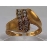 A 9 carat gold diamond ring, size M, 3 gms.