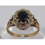 A 9 carat gold sapphire and diamond ring, size J, 2.3 gms.