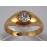 A yellow metal (tests 18 carat gold) old brilliant cut diamond solitaire ring,