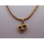 A 9 carat gold diamond set heart pendant necklace, approx 38cm long, 3.7 gms.