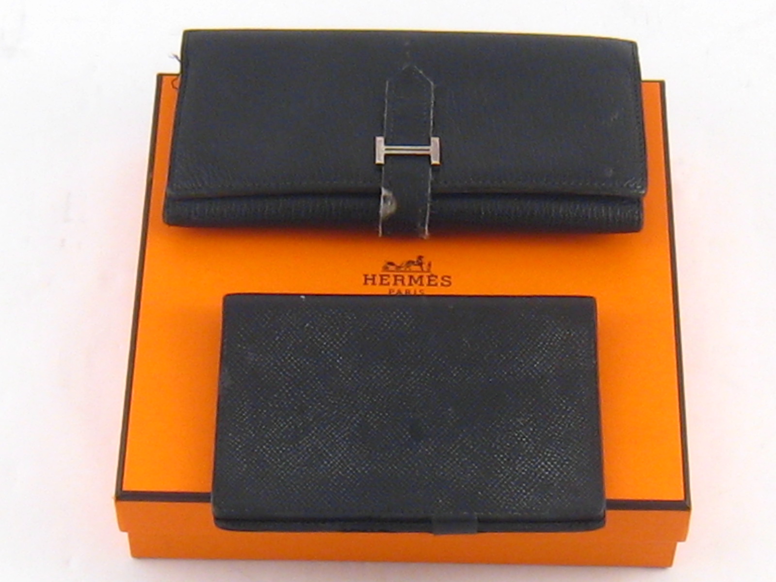 Vintage Hermes. A purse/wallet and a folding notebook cover in a later Hermes box.