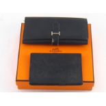 Vintage Hermes. A purse/wallet and a folding notebook cover in a later Hermes box.