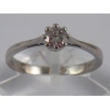 An 18 carat white gold diamond solitaire ring,