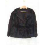 A mink fur jacket, size S.