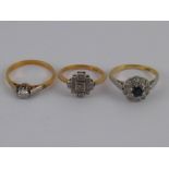 A mixed lot comprising three yellow metal (tests 18 carat gold) diamond rings,