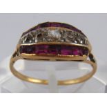 A yellow metal (tests 18 carat gold) ruby and old cut diamond ring, size L, 2.2 gms.
