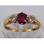 A fine yellow metal (tests 18 carat gold) ruby and diamond ring, ruby approx 6 x 5mm,