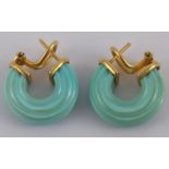 A pair of yellow metal (tests 18 carat gold) mounted ceramic earrings, approx 2cm.