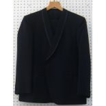 A Simon Ackerman black cocktail suit. One button jacket with a shawl collar. Size M/L.