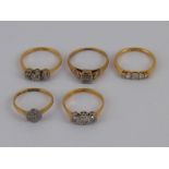 A mixed lot comprising five 18 carat gold rings, all marked 18ct plat, circa 1900-1930, sizes J-N,