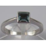 A 9 carat white gold aquamarine ring, aquamarine approx 4 x 4mm, ring size K ½, 2.8 gms.