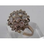 An 18 carat white gold round brilliant cut diamond cluster ring,