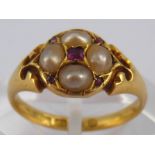 An antique 18 carat gold ruby and split pearl ring, hallmarked Birmingham 1900, ring size L, 3.